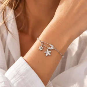Bracelet Floréal argenté avec épingle et fleurs en zircons