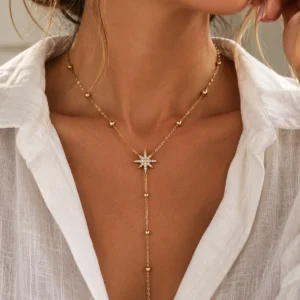 Collier doré Astra en Y avec trois étoiles serties de zircons