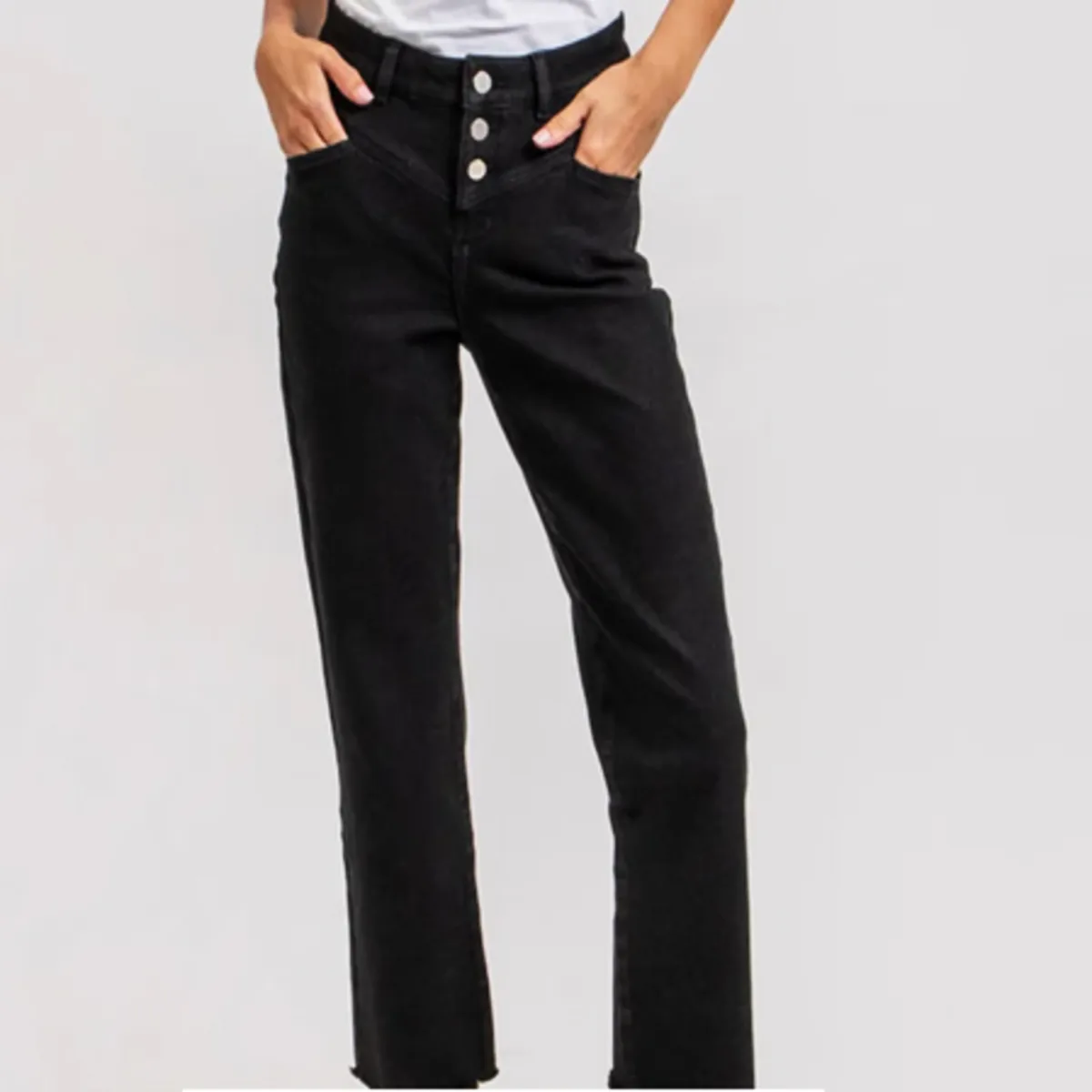 jean bootcut cropped noir avec braguette boutonnée
