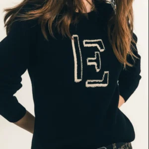 Pull noir monogramme avec motif intarsia sur le devant