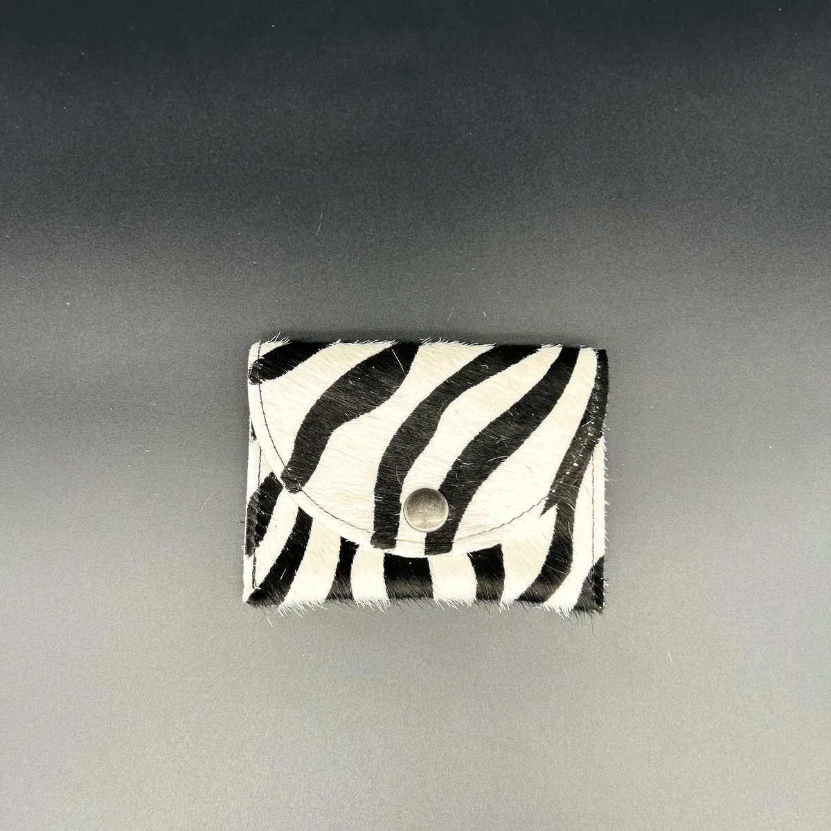 Porte-monnaie zèbre en cuir véritable avec bouton-pression métallique